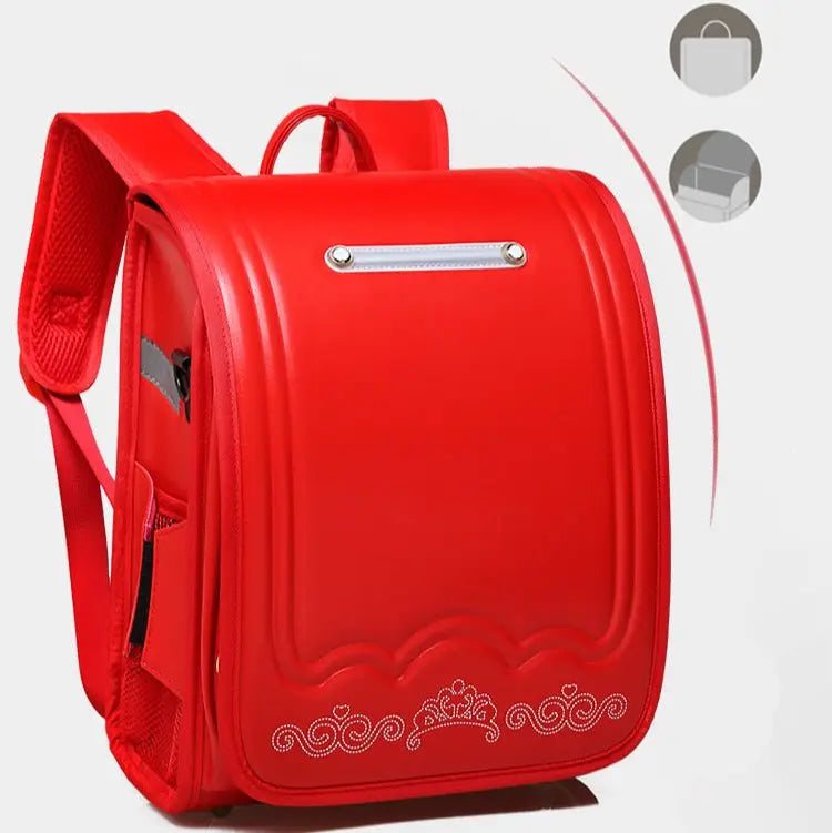 Sac à dos scolaire japonais rigide rouge vu de profil avec poche latérale