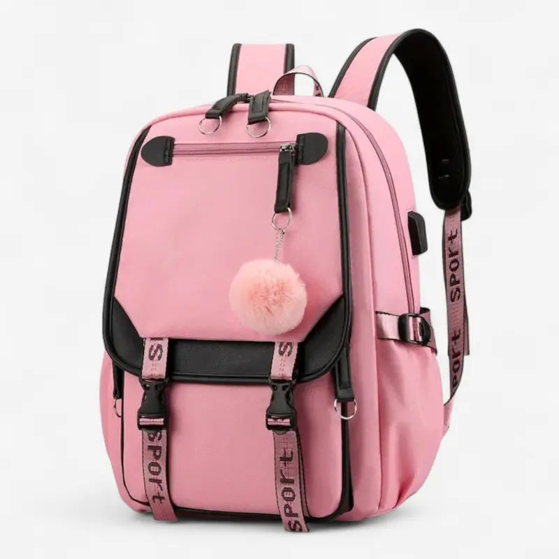  Sac à dos scolaire rose avec port USB et pompon décoratif, vue de côté.
