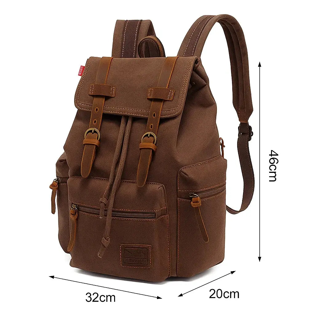 Sac à dos vintage en toile marron avec sangles en cuir, dimensions 46 × 32 × 20 cm.