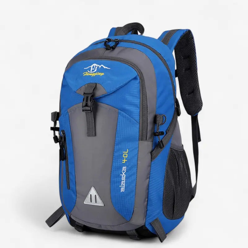 Sac à dos de voyage 40L bleu et gris avec port USB intégré, léger et robuste