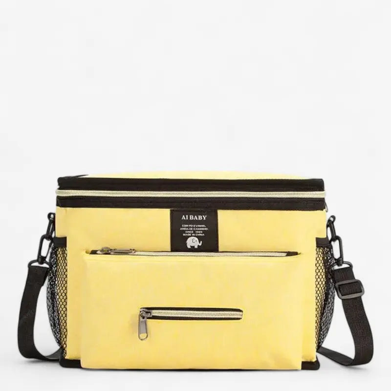 Sac à langer bandoulière jaune avec poche frontale zippée