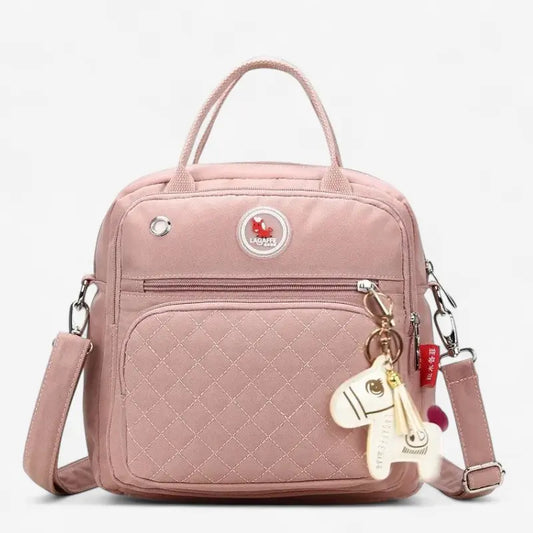 Sac à langer bébé rose matelassé élégant avec bandoulière