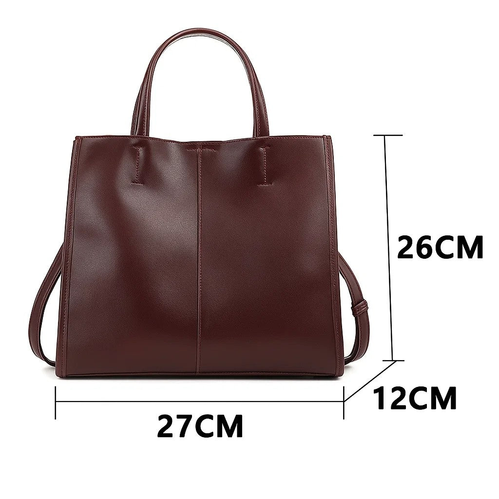 Vue de face d’un sac à main marron en cuir avec dimensions indiquées 27 × 12 × 26 cm.