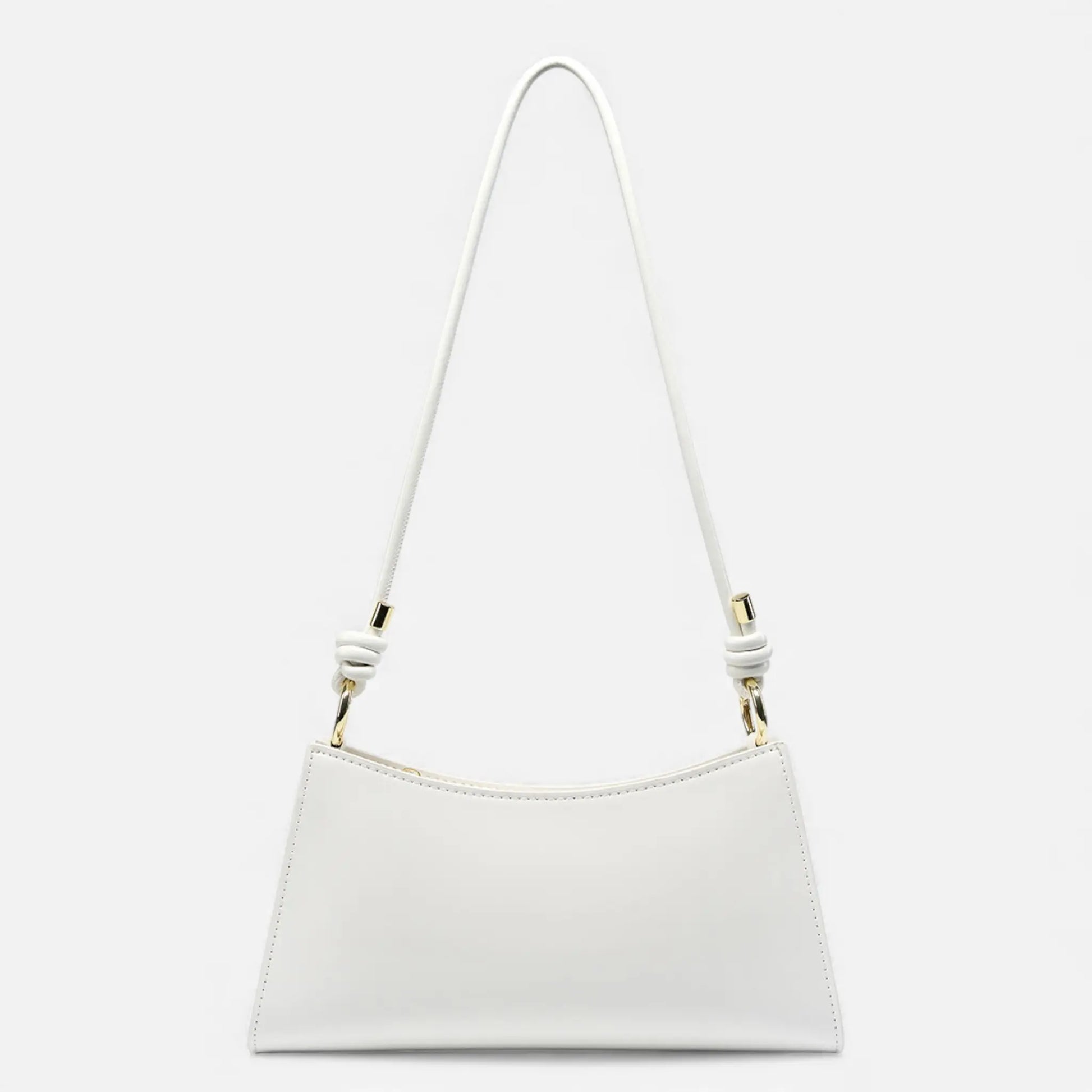 Sac baguette en cuir blanc cassé vu de face
