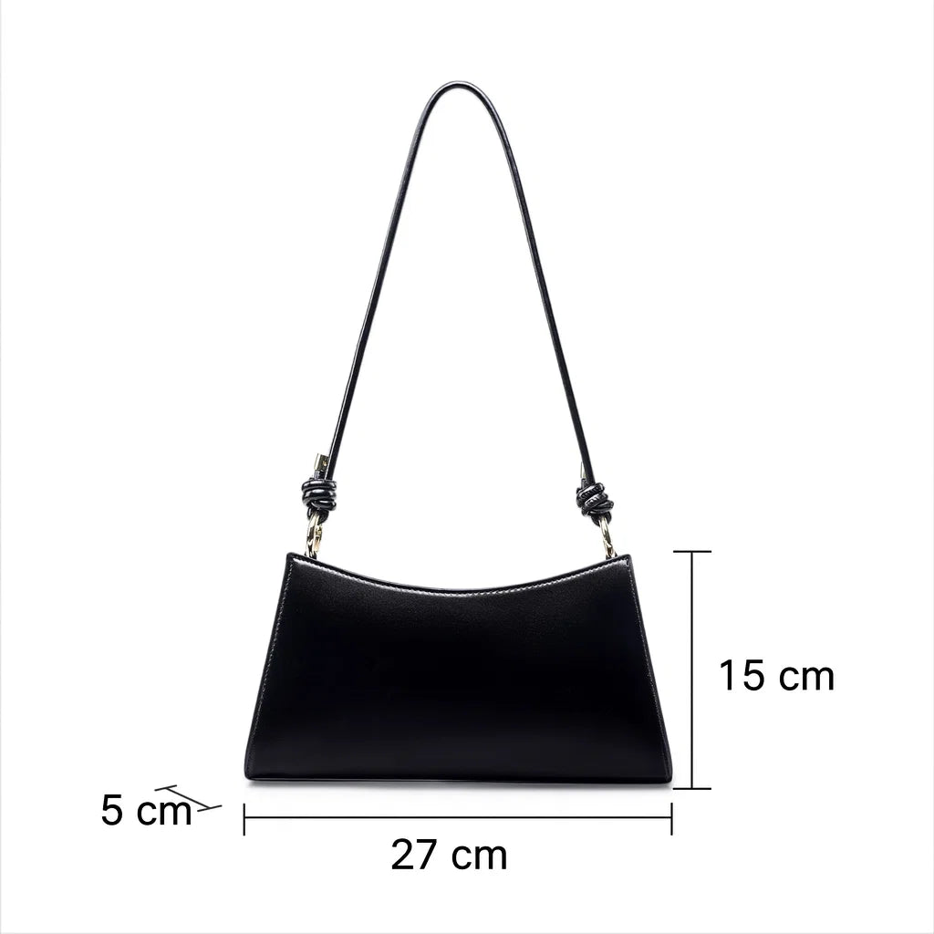 Dimensions du sac baguette en cuir noir 27 x 15 x 5 cm
