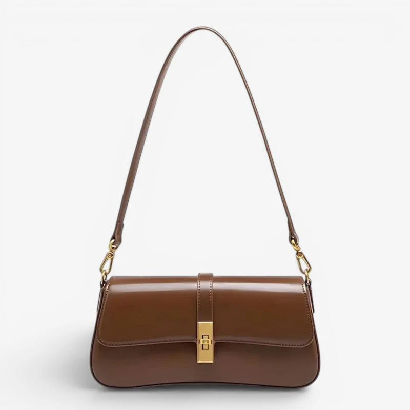 Sac baguette en cuir véritable marron vu de face avec fermeture dorée