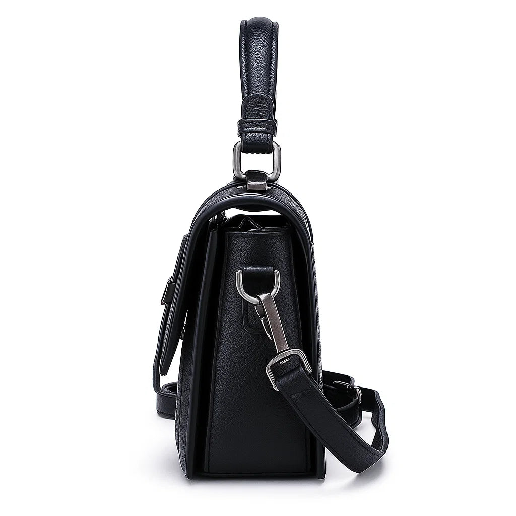 Vue latérale du sac bandoulière noir en cuir matelassé