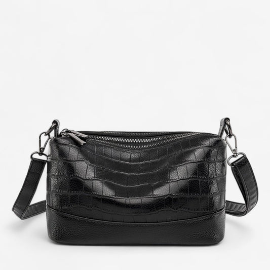 Sac bandoulière en cuir de vachette noir avec motif damier façon croco et bandoulière ajustable