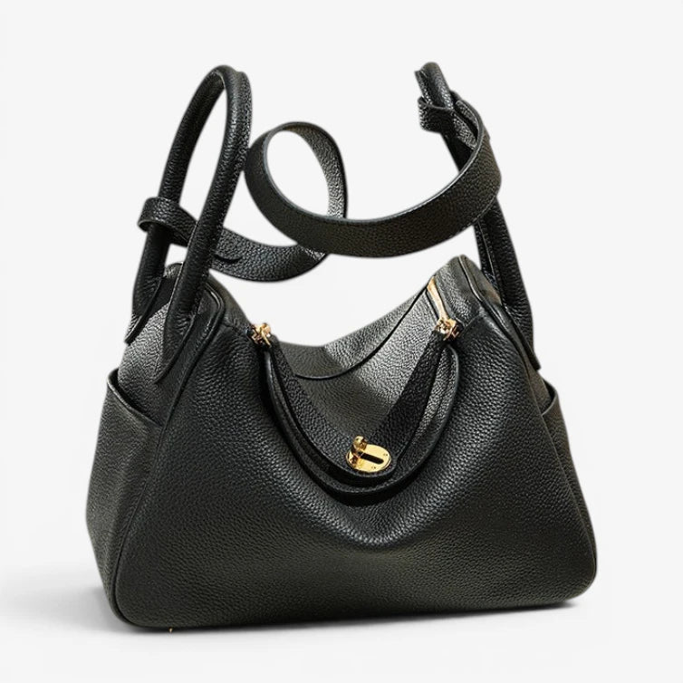 Sac bandoulière femme en cuir de vachette noir avec fermoir métallique couleur or