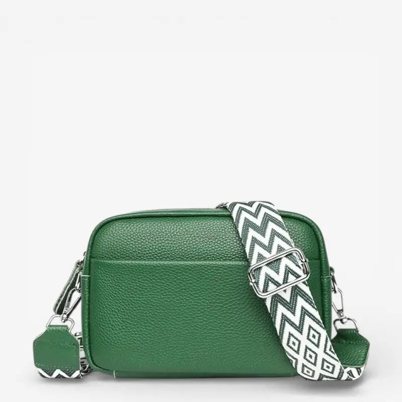 Sac bandoulière vert en cuir de vachette avec sangle géométrique verte et blanche