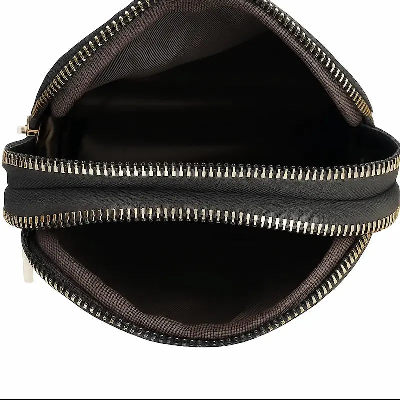 Sac bandoulière femme noir ouvert avec espace intérieur doublé