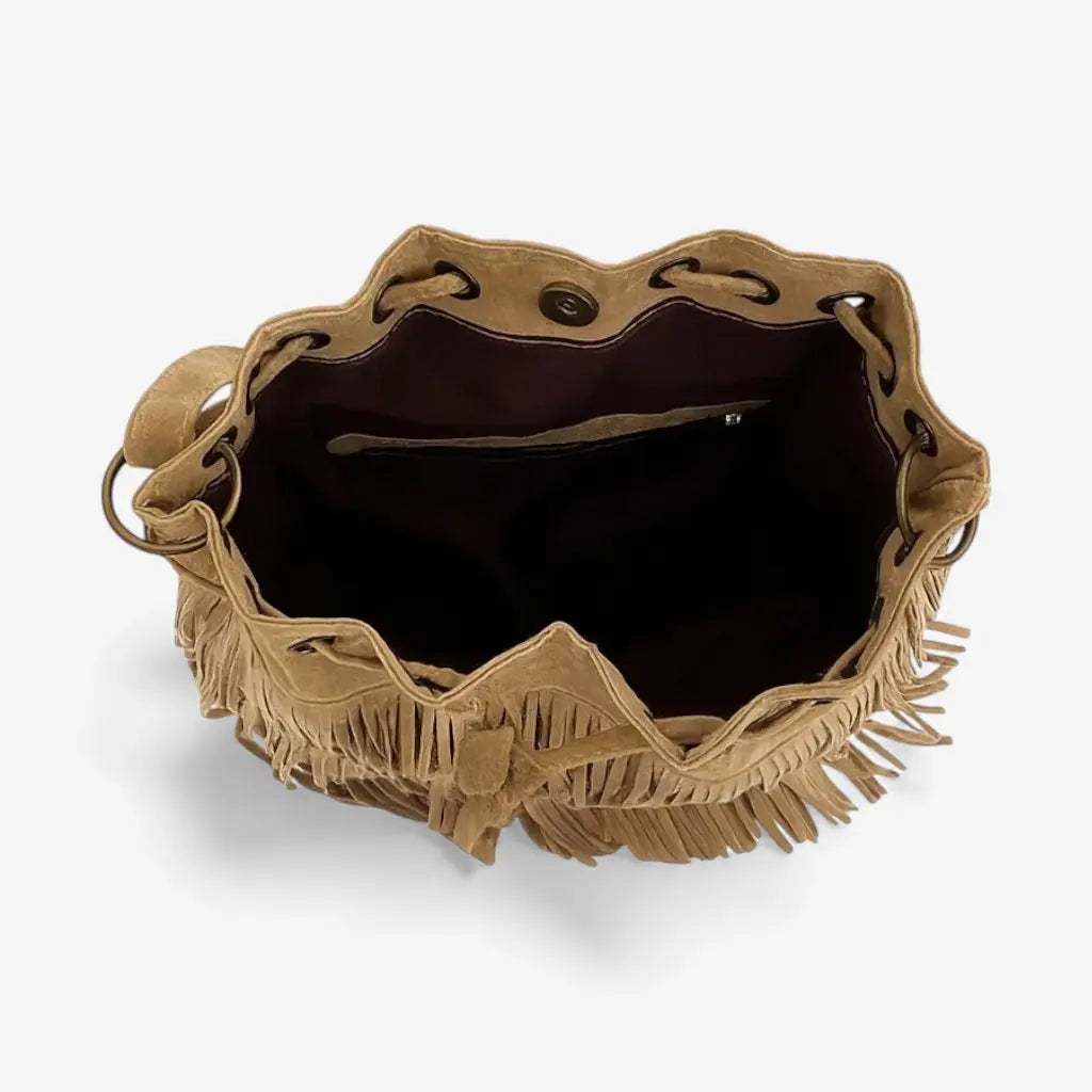 Vue intérieure vide du sac bourse à franges avec ouverture large