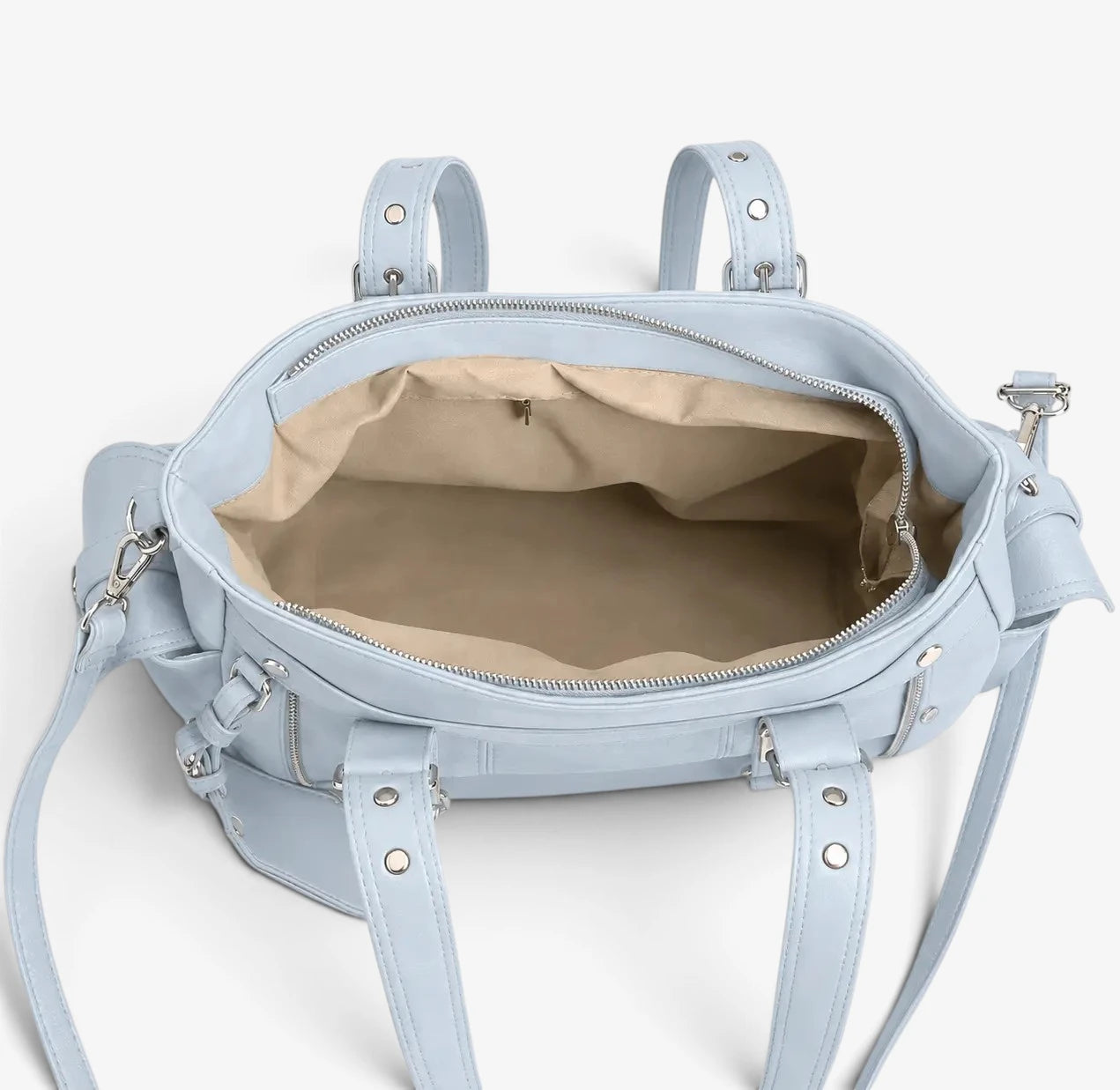 Intérieur du sac cabas bleu avec compartiment principal et poches