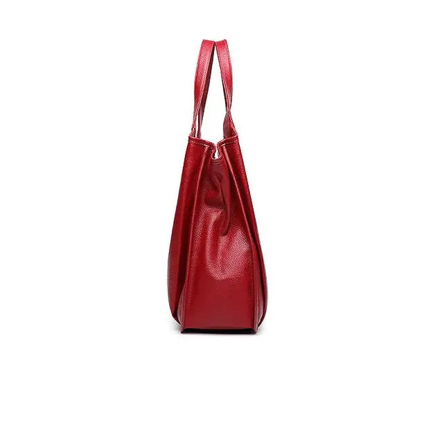 Vue de profil du sac cabas en cuir rouge avec profondeur 14 cm