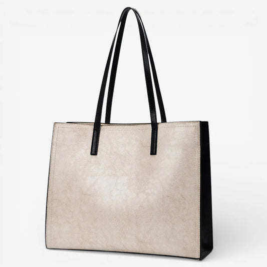 Sac cabas femme en cuir de vachette beige et noir grand format avec double bandoulière porté épaule