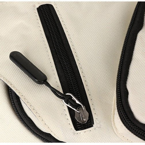 Sac convertible 2-en-1 blanc détail de la fermeture éclair renforcée