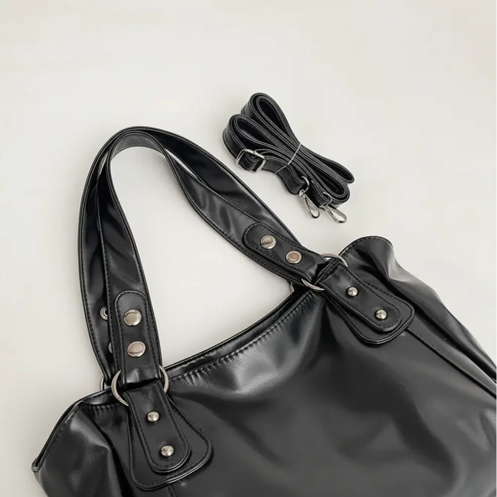 Sac de cours femme noir grande capacité avec poignée renforcée et détails métalliques