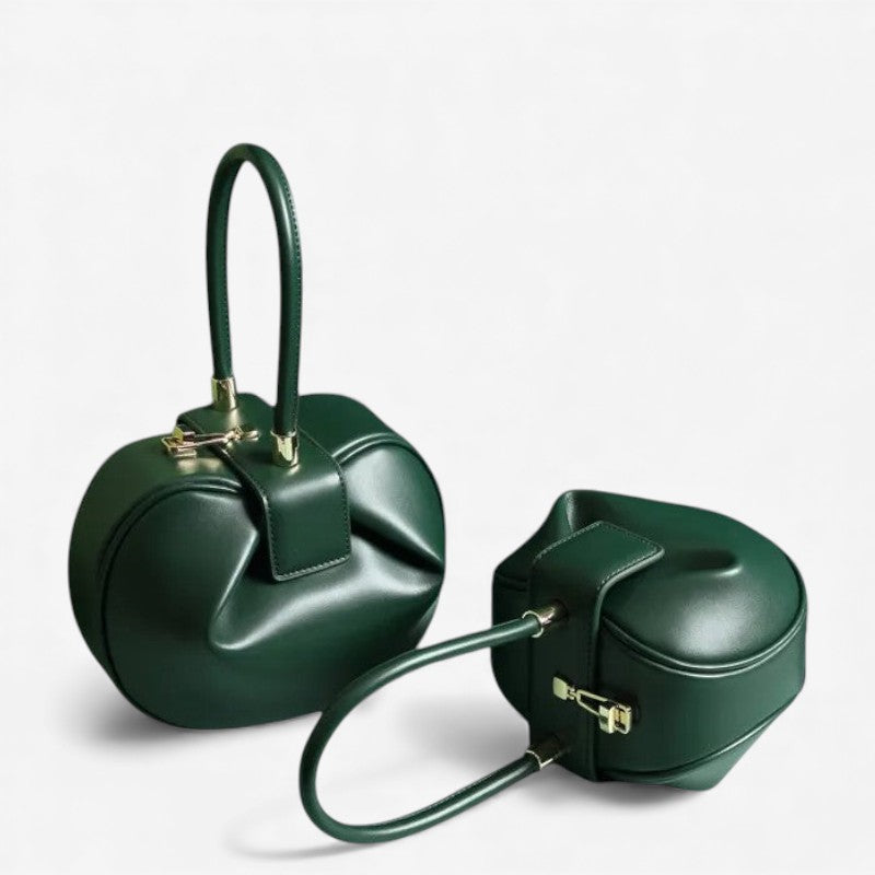 Sac cabas en cuir bombé vert en grand et petit modèle côte à côte