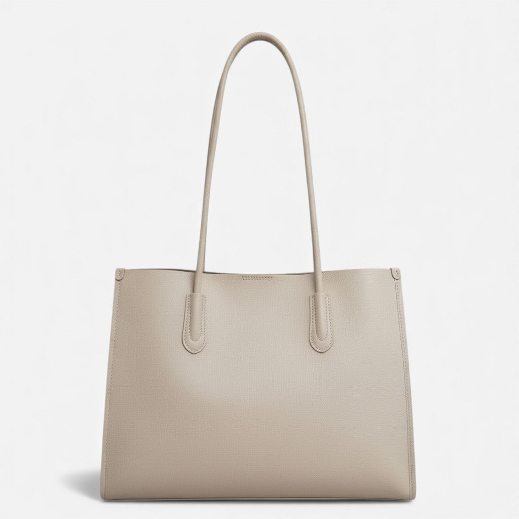 Vue avant du sac en cuir blanc pour femme, design minimaliste et moderne