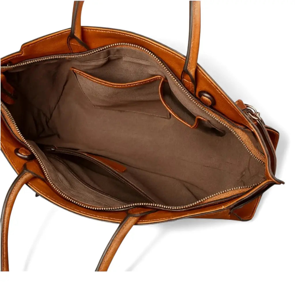 Intérieur d’un sac en cuir marron montrant les compartiments et poches