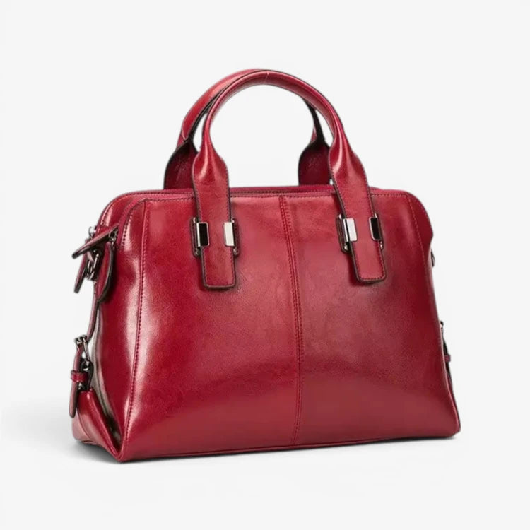 Sac en cuir rouge pour femme vu de trois quarts avec bandoulière amovible