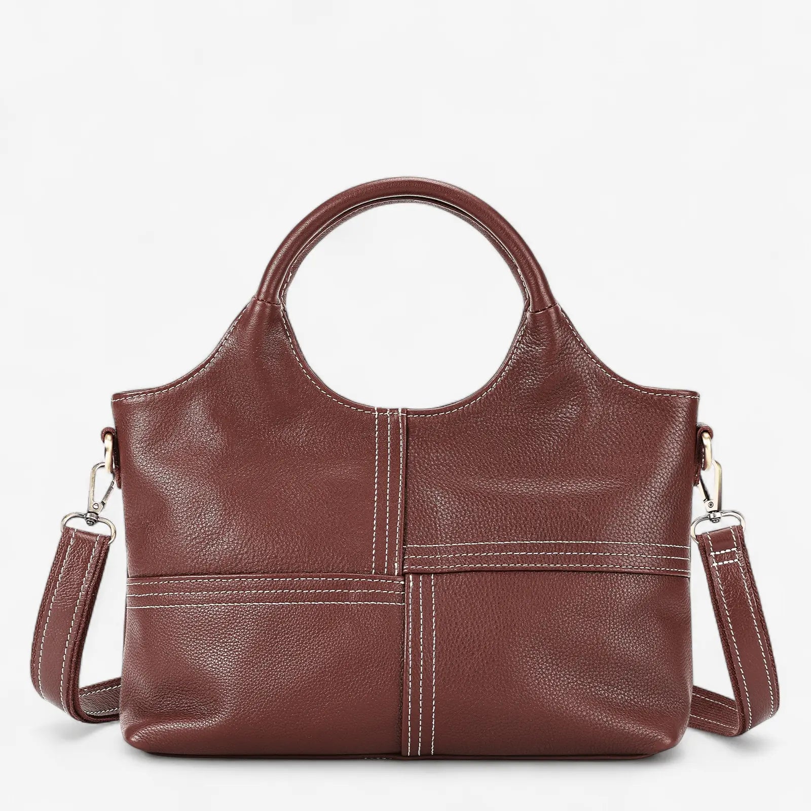 Vue avant du sac à main en cuir marron avec coutures croisées et bandoulière amovible.