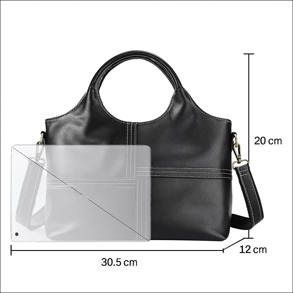 Vue avant du sac à main en cuir noir avec dimensions indiquées 30,5 × 20 × 12 cm et bandoulière réglable.