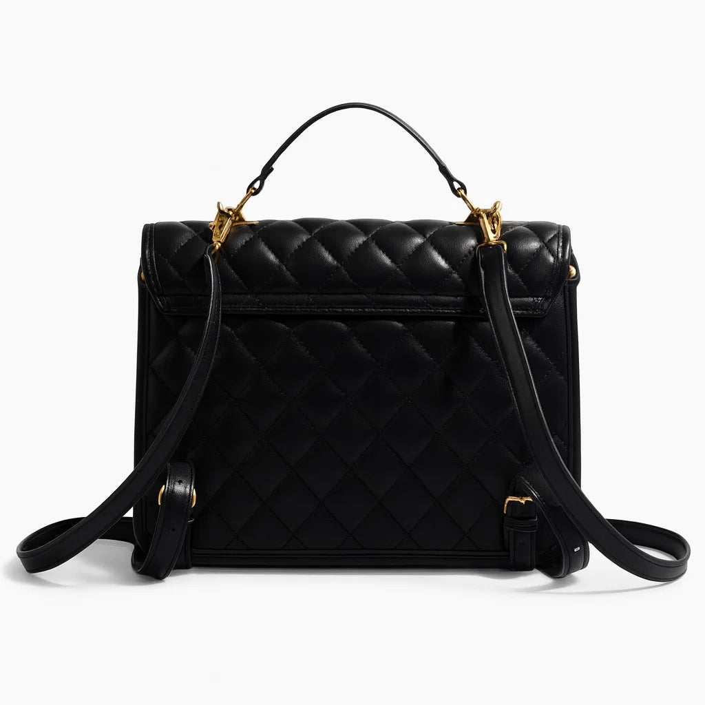 Vue arrière du sac matelassé noir avec bretelles ajustables
