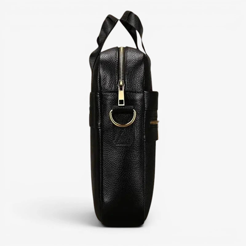 Vue latérale du sac ordinateur noir en cuir véritable avec anneau doré