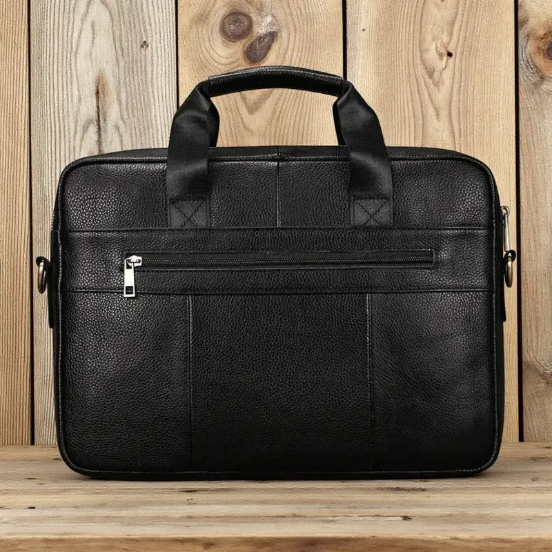 Vue arrière du sac ordinateur noir en cuir véritable grainé