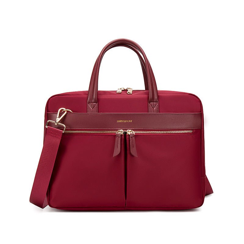 Sac ordinateur rouge imperméable avec poignées et bandoulière amovible