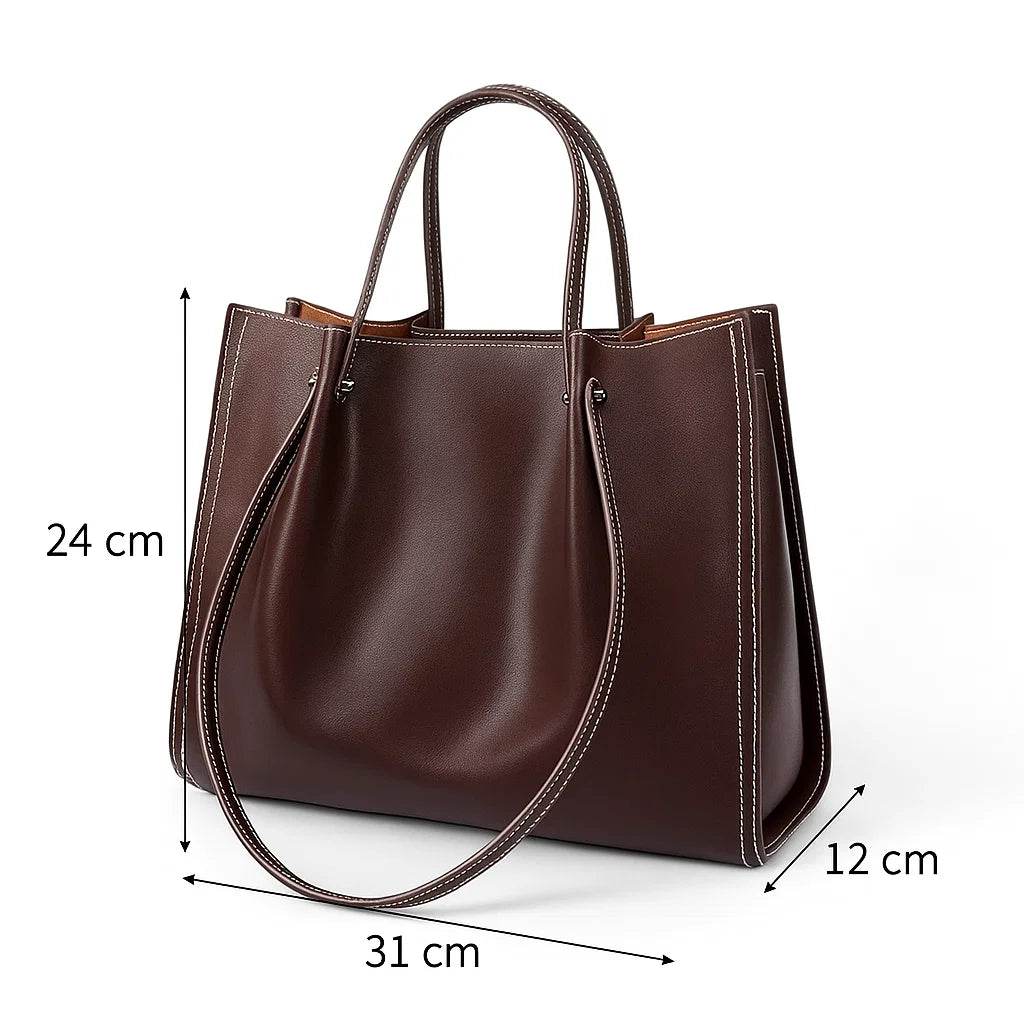 Vue de face du sac porté épaule marron avec indication des dimensions 31 × 12 × 24 cm.