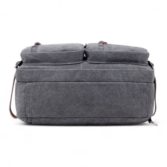 Vue du dessous sac en toile homme gris avec base renforcée et coutures visibles