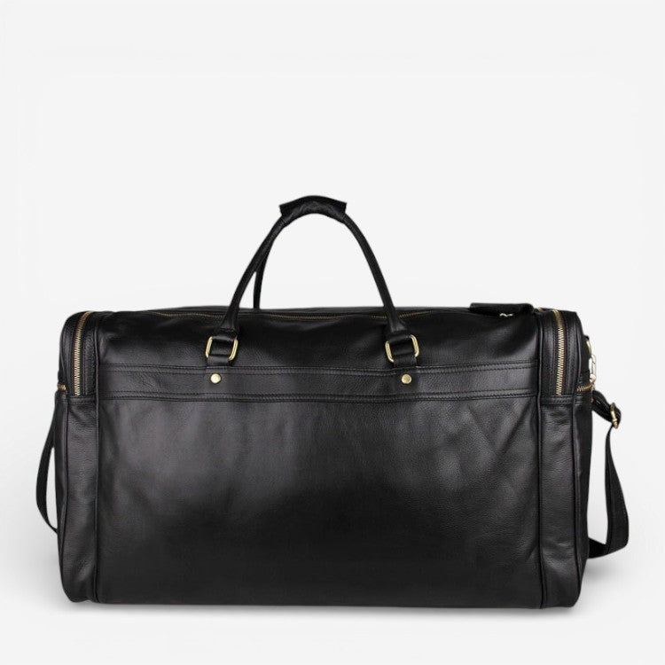 Vue de dos du sac de voyage noir en cuir pleine fleur avec poignées rigides