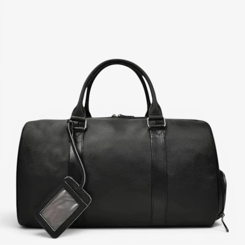 sac de voyage en cuir noir petit format – vue de face avec étiquette porte-nom