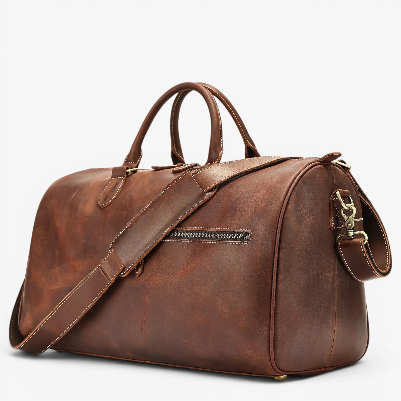 Sac de voyage en cuir de vachette marron  avec bandoulière réglable