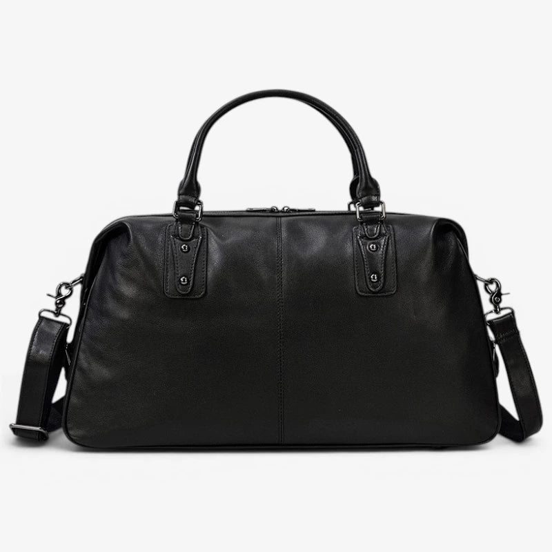 Vue de face du sac de voyage en cuir véritable avec bandoulière amovible
