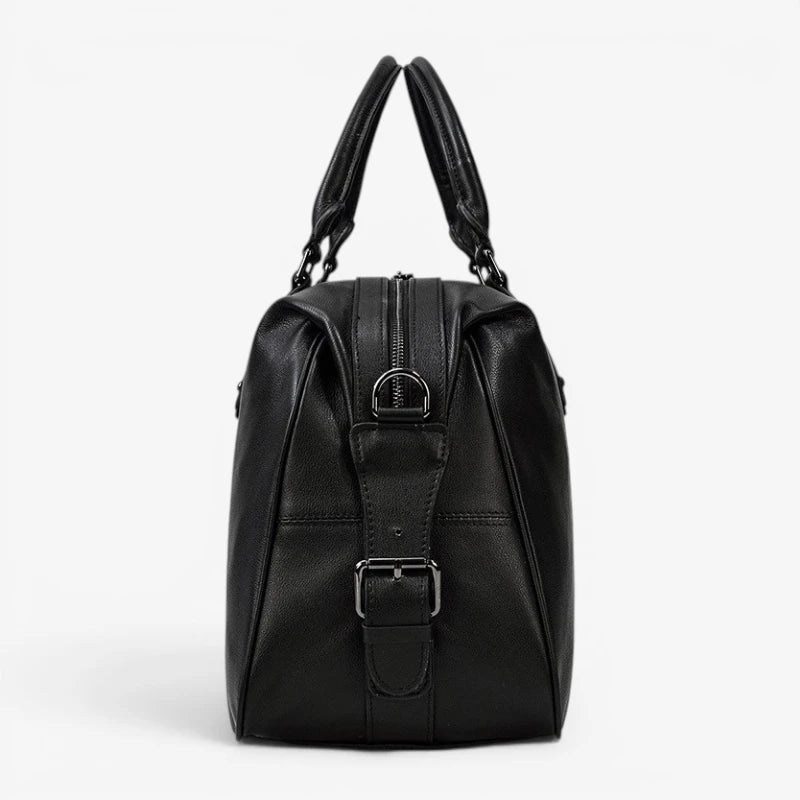 Vue de profil du sac de voyage en cuir véritable avec bandoulière réglable