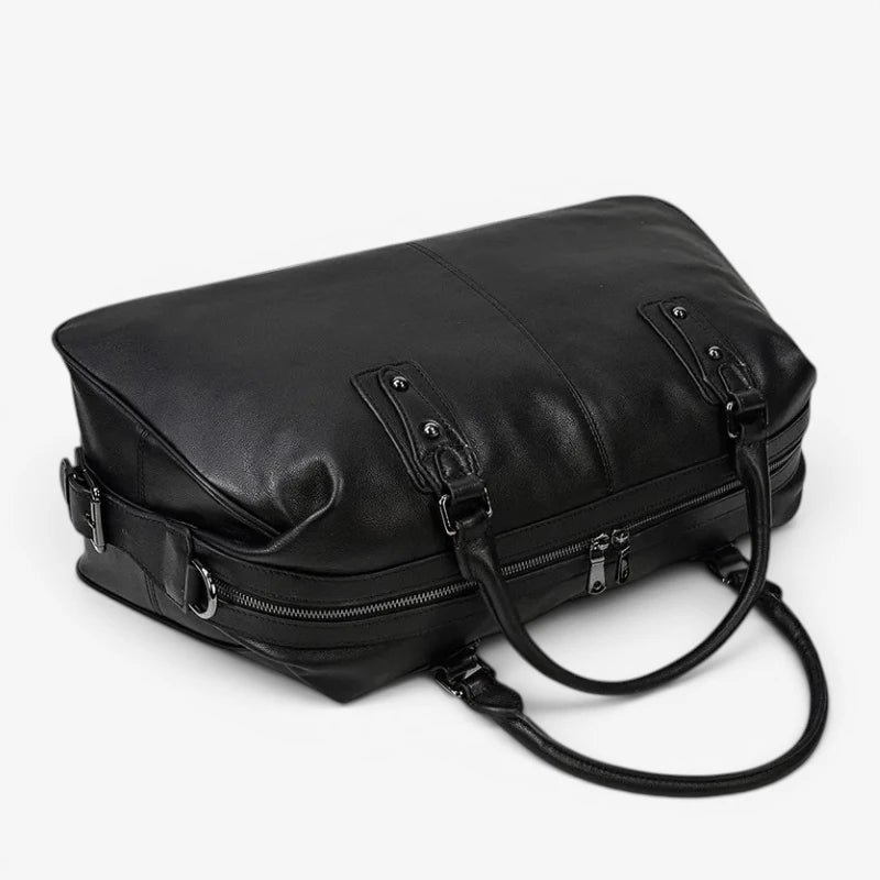 Vue de dessus du sac de voyage en cuir véritable avec fermeture zippée