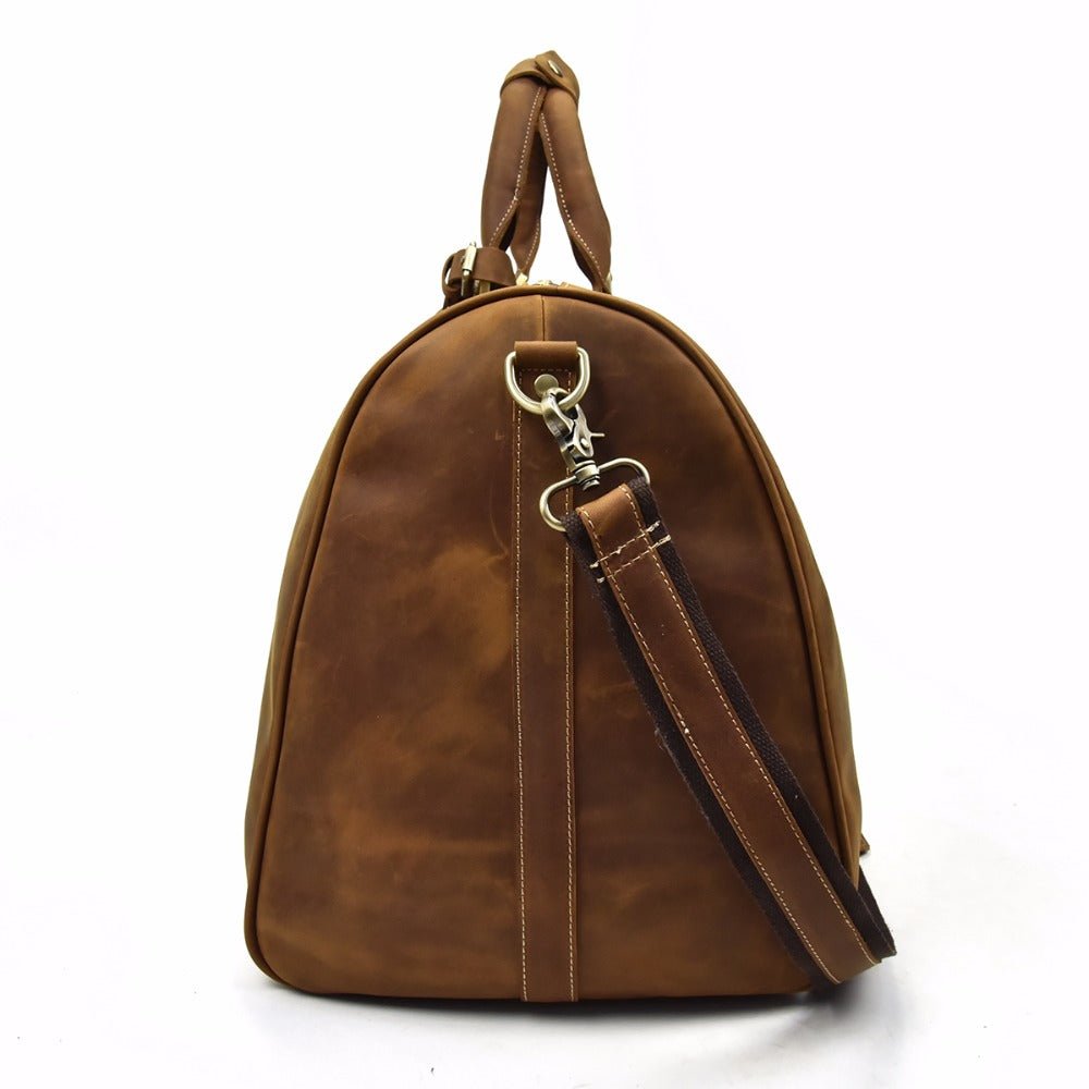 Vue latérale sac de voyage homme en cuir véritable avec bandoulière
