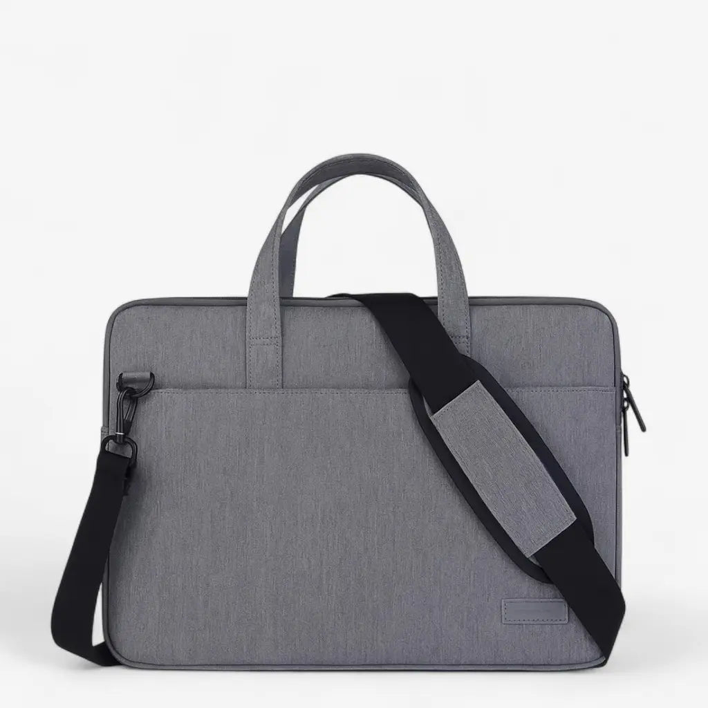 Sacoche ordinateur gris foncé présentée fermée.