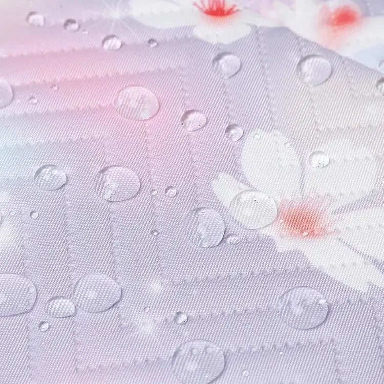 Texture imperméable du tissu du sac à dos scolaire fille rose et violet